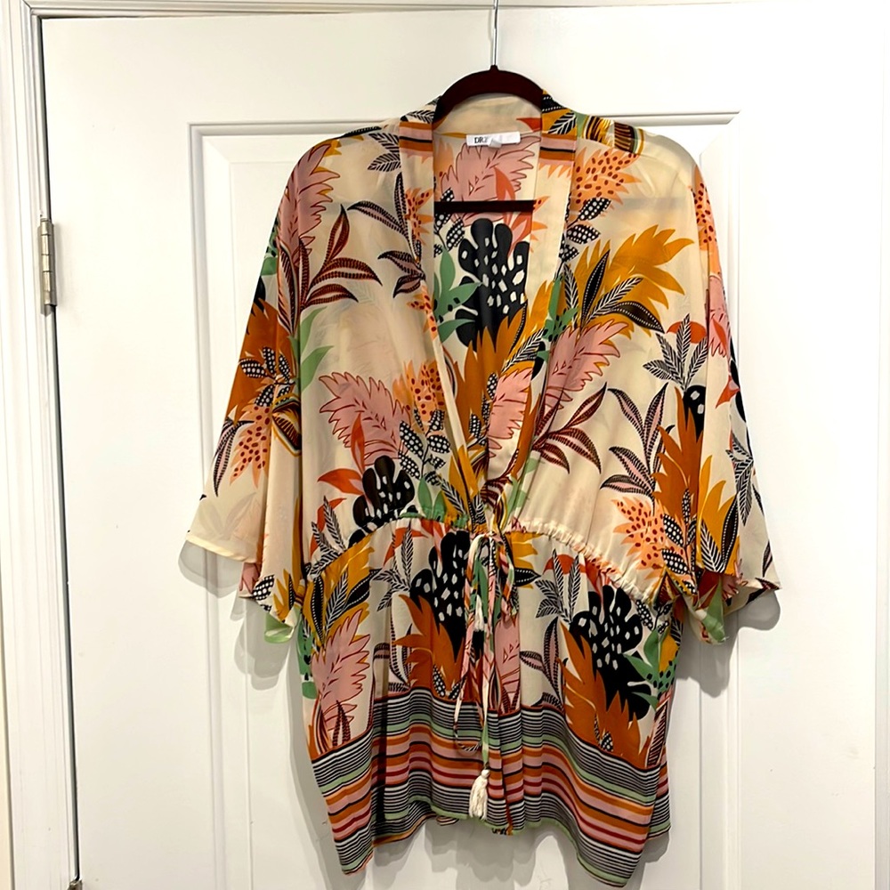 Beautiful sheer floral cover size L/XL